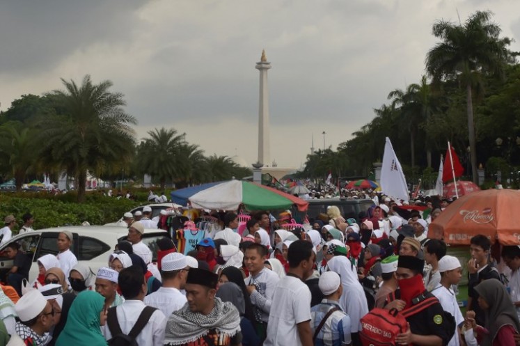 Indonesians gather ahead of a protest against US President Donald Trump's recent decision to recognise Jerusalem as the capital city of Israel, at the US embassy in Jakarta on Dec. 17, 2017. Thousands attended the rally organised by the country's top Islamic authority, the Indonesian Ulema Council (MUI), backed by the government as well as several other Islamic organisations.