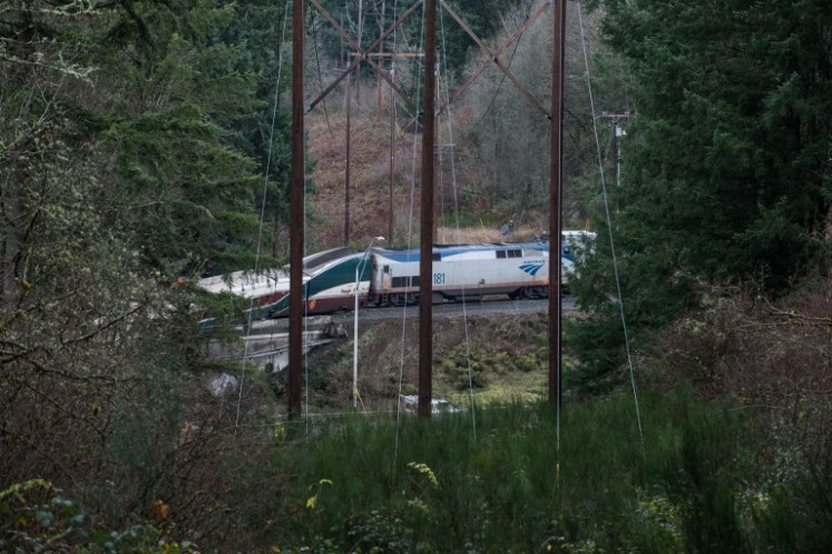The scene after an Amtrak high speed train derailled from an overpass early Dec. 18, 2017 near the city of Tacoma, Washington state. 