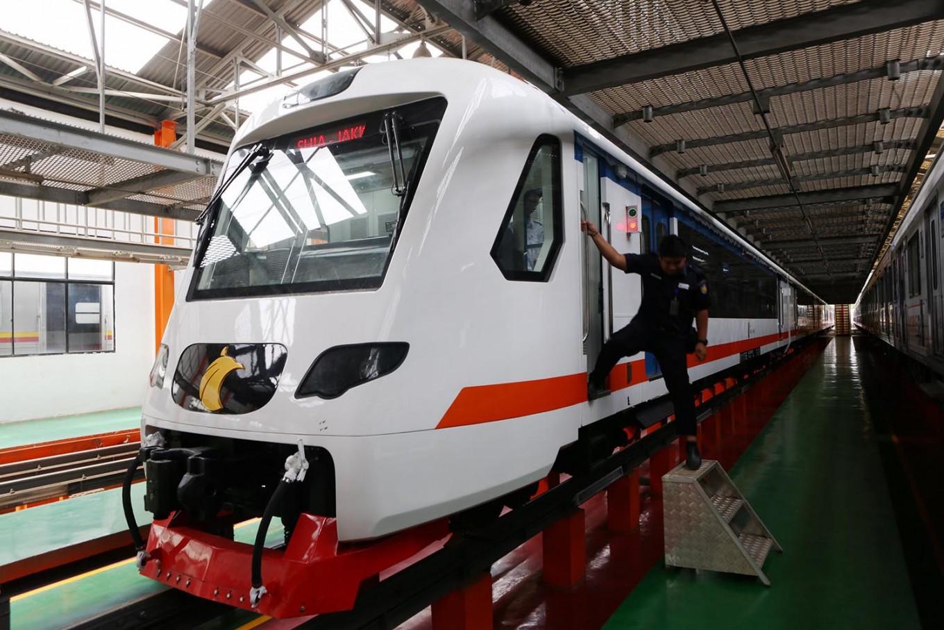 PT Railink workers check the equipment of the new airport train in Manggarai railway depot, Jakarta on November 24. Image: JP/Seto Wardhana