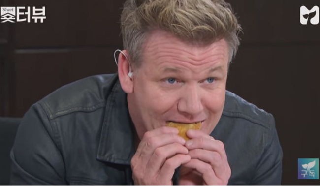The British TV star was featured in a short interview clip Thursday where he tried out Korean street food 'bungeo-ppang', a fish-shaped pastry stuffed with sweetened red bean paste. 