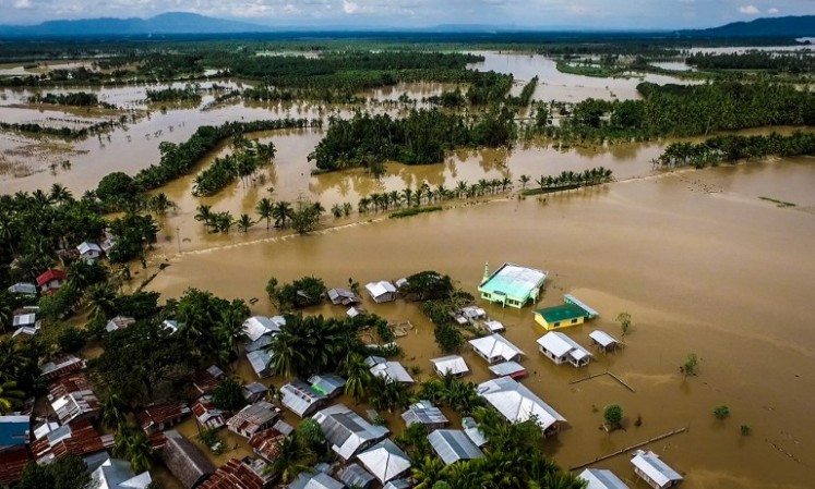 A general view of the flooded Municipality of Kabacan, North Cotabato, on the southern island of Mindanao on December 23, 2017, after Tropical Storm Tembin dumped torrential rains across the island. The death toll from a tropical storm in the southern Philippines climbed swiftly to 133 on December 23, as rescuers pulled dozens of bodies from a swollen river, police said.