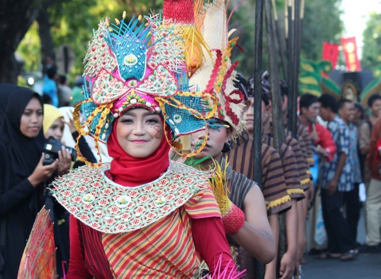 A participant of the Klaten Lurik carnival. The Klaten Lurik carnival has always attracted tourists to visit the regency.