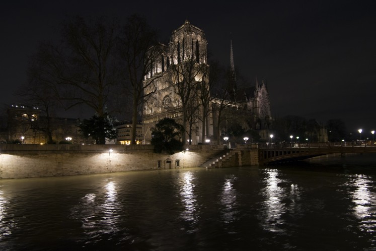A picture taken in Paris on January 29, 2018 shows the cathedral Notre dame de Paris as the Seine burst its banks following torrential rain. 