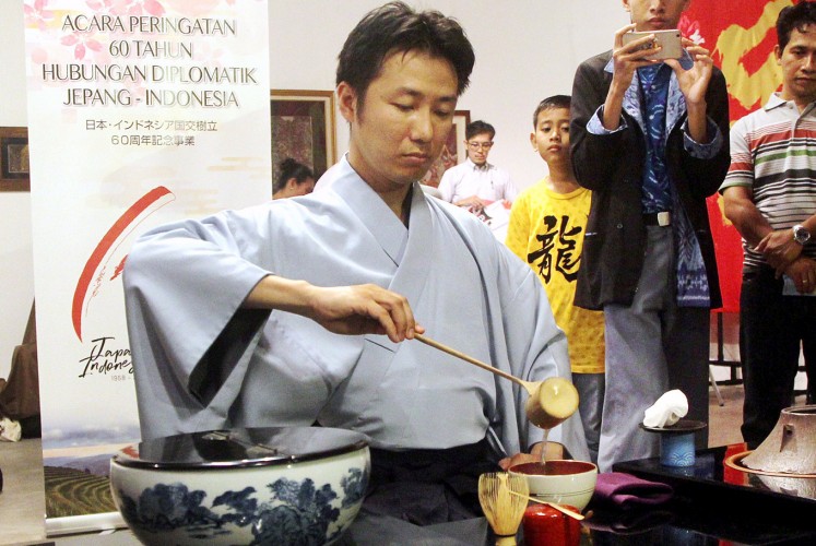 Art of tea: Shusaku Yasumaru shows how to serve traditional Japanese tea.