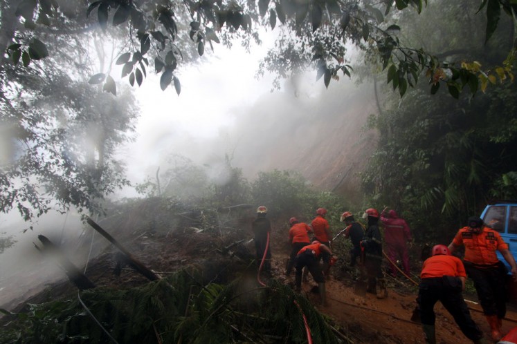 Landslides as a result of heavy downpour have affected locations in Puncak, a hilly area in Bogor, West Java, on Monday morning, forcing the authorities to temporarily close the road.