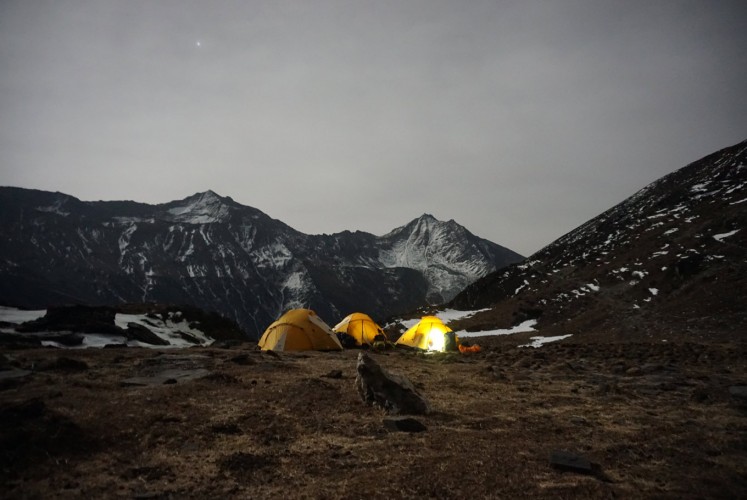 The sight of a camp at night.