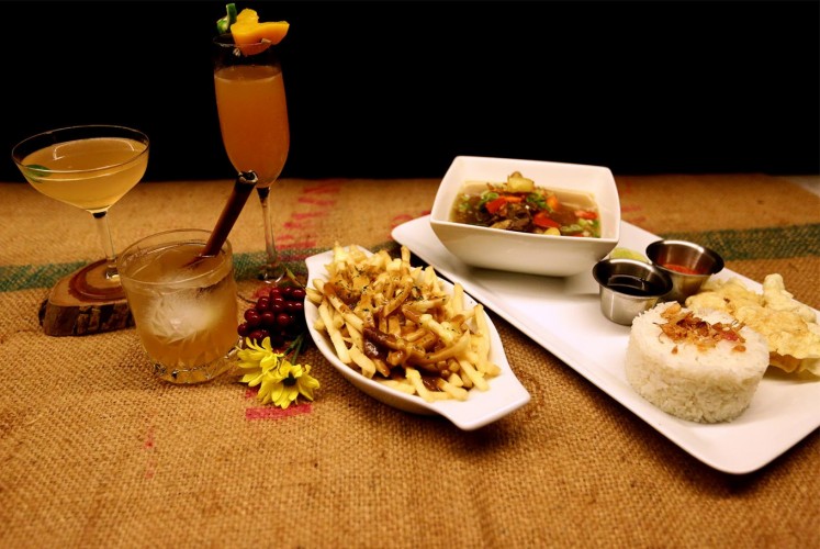 Signature dishes at Beer Garden SCBD include Bourbon Legend, Lychee Basil, Peach Spritzer, Oxtail Soup and Pommes Poutine.