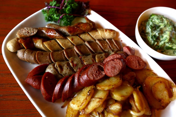 For food, Die Stube is known for its homemade sausage.