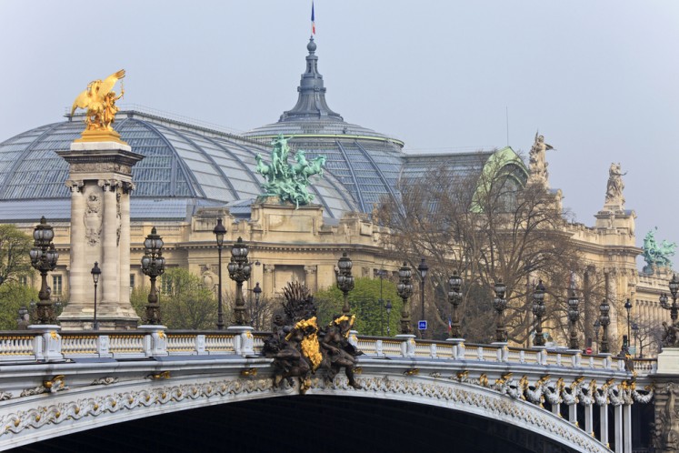 Bridge Alexander III and the Grand Palace in the background in Paris, France.