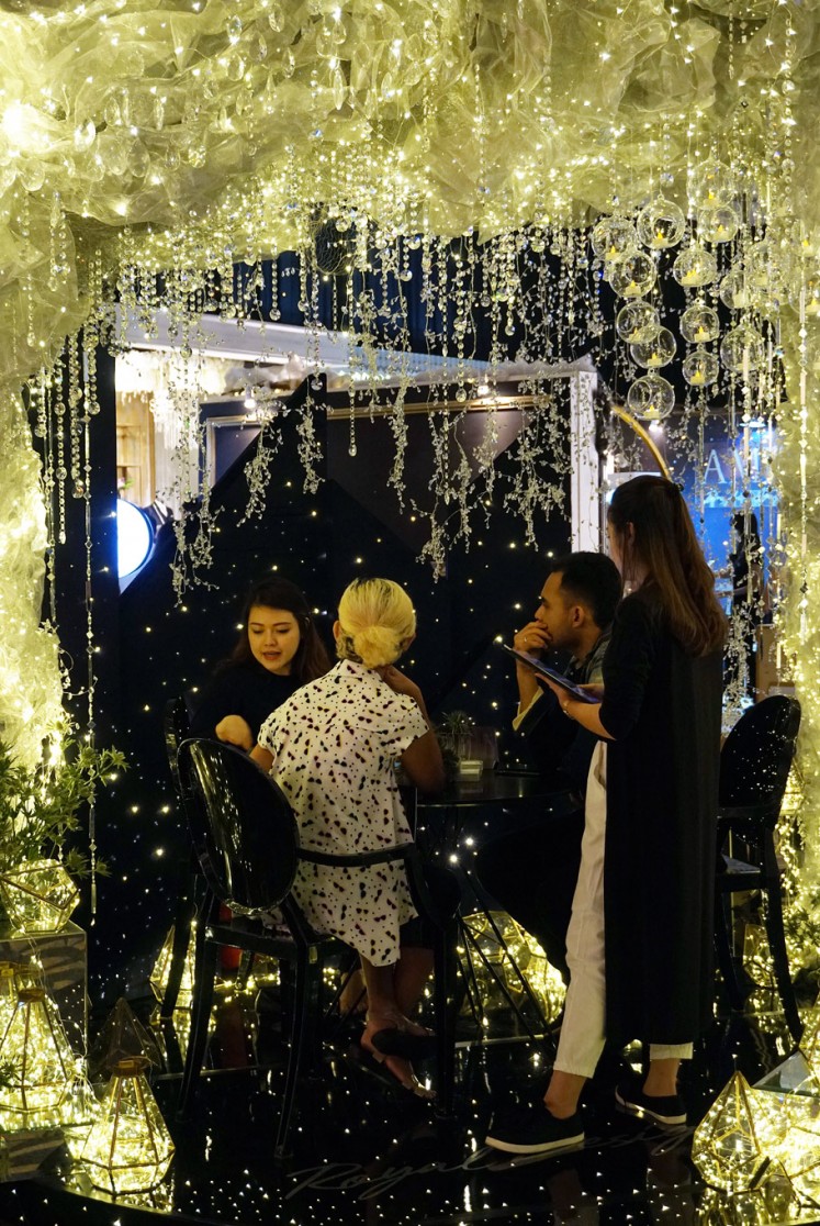 Sparkling: Colorful lights set the mood at this year's Bridestory Fair in line with its theme, 'Stardust', at the Sheraton Hotel's grand ballroom in Jakarta.