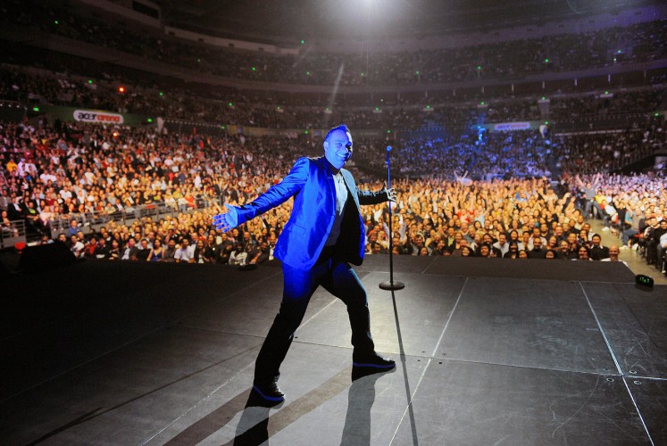 Jam-packed: Russell Peters performs at Acer Arena, meanwhile renamed Allphones Arena, in Sydney, Australia, back in 2010.