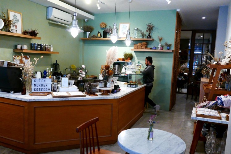 The interior of Guten Morgen - Coffee Lab & Shop in Tomang. 