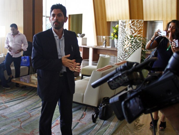 Orestes Fintiklis, managing partner of Ithaca Capital Partners, which now owns the hotel and the majority of the condo units at the Trump International Hotel & Tower speaks with journalist in the hotel's lobby in Panama City on March 5, 2018. 