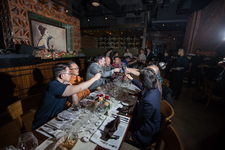 Wine connoisseurs enjoying Joseph Drouhin dinner at VIN+ Plaza Senayan Arcadia