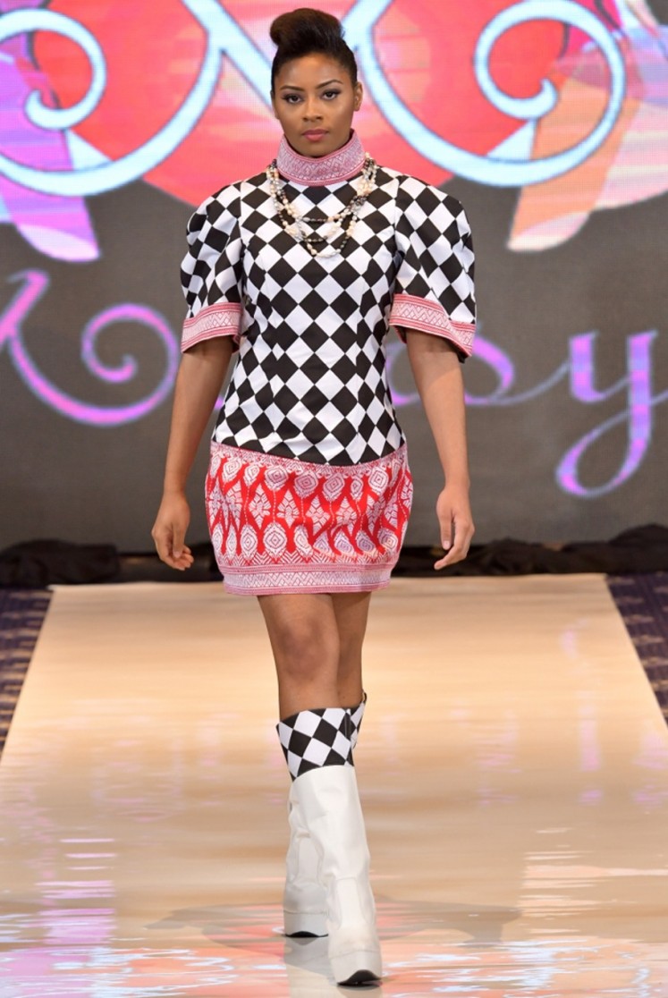 A model walks down the catwalk wearing one of the pieces from Anna Mariana's 'Babe' collection at DC Fashion Week.