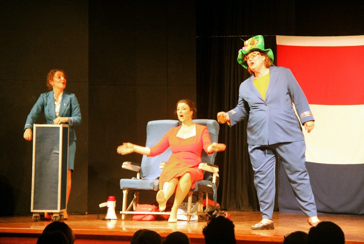 Comical: Dutch actresses Mechteld Schelberg (left) and Anna Nicolai (right), along with British guest artist Camilla van Doorn, perform a play about the Dutch people.