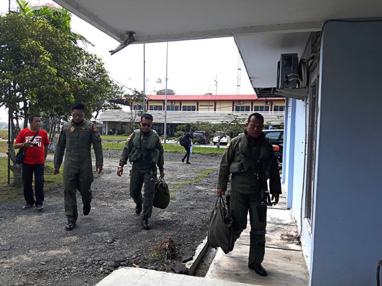 On a mission: Indonesian Air Force pilots walk at Hang Nadim International Airport in Batam. Opened in 1945, the airport is equipped with a runway of 4,025 meters, the second-longest runway in South East Asia, after that of Kuala Lumpur International Airport.   