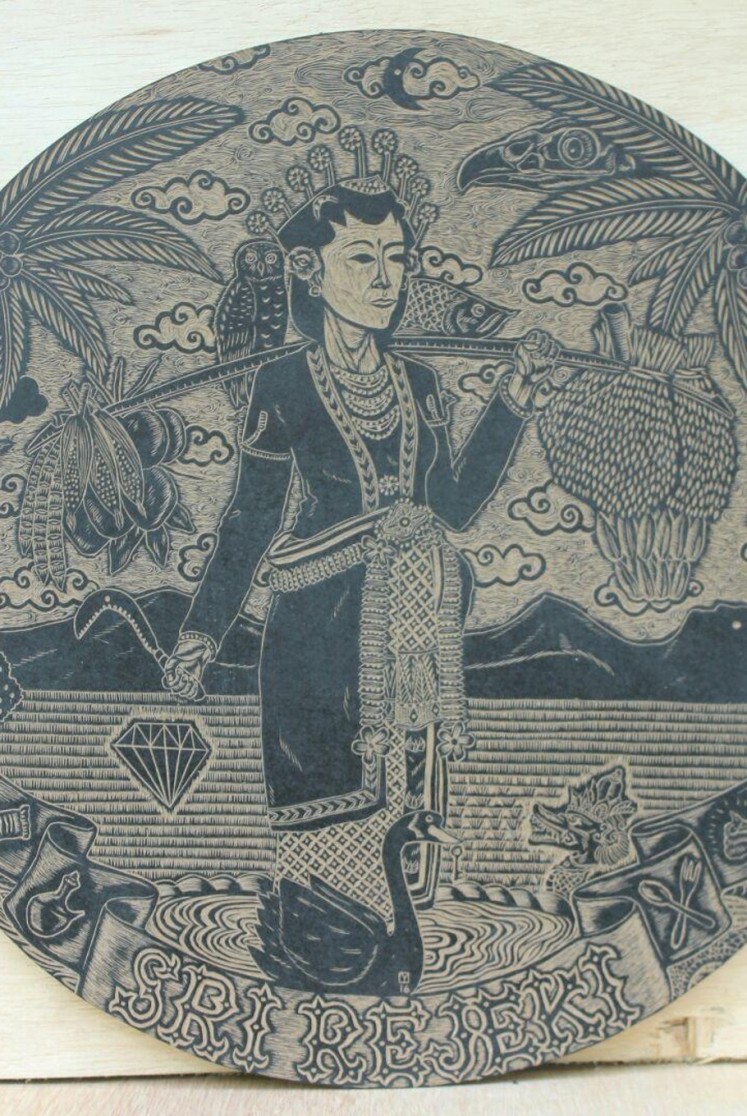'Sri Rejeki' (2018) by Ucup Baik was made using a woodcut technique, and emphasizes the importance of counting ones blessings and being thankful. 
