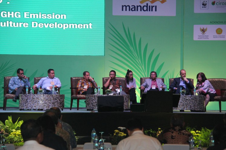 A panel discussion at ICOPE 2016 on Oil Palm Development and GHG Emission: Slash and Burn Practice in Agriculture development with CIFOR Indonesia, Head of District Seruyan, SPKS, GAPKI and WRI.