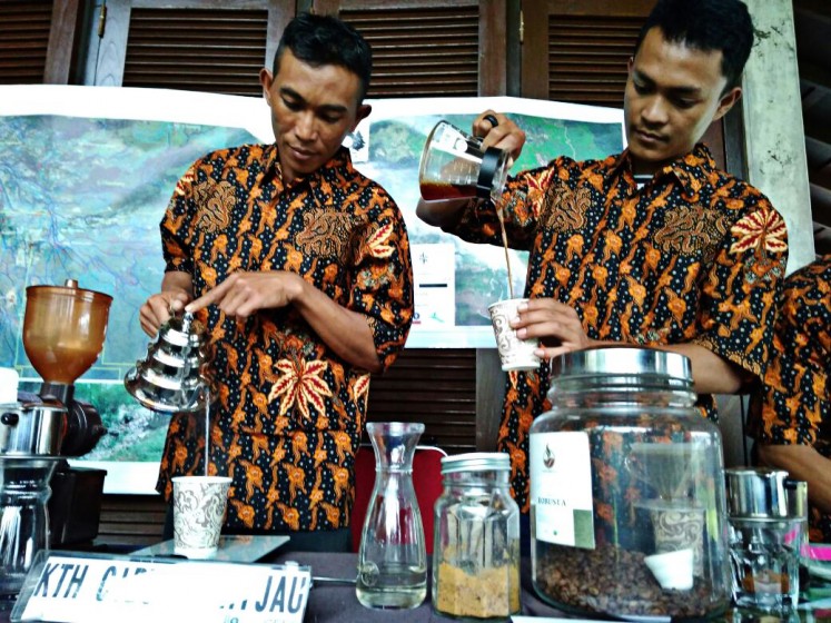 Natural products: Members of the Cibulao Hijau Forest Farming Group demonstrate forest products at Gunung Mas meeting hall in Bogor, West Java, on April 3.