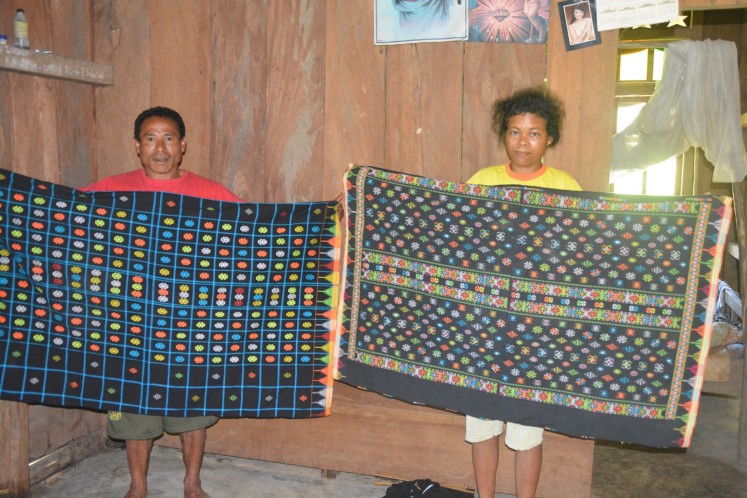 Women in East Manggarai, Flores, show off their 'rembong' woven fabrics.