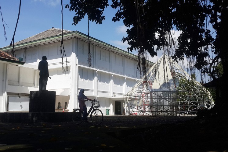 The center of attention: A giant frame in the shape of a diamond, which will be a terrarium for the work of commissioned artist Mulyana, is seen outside the Jogja National Museum in Yogyakarta. 
