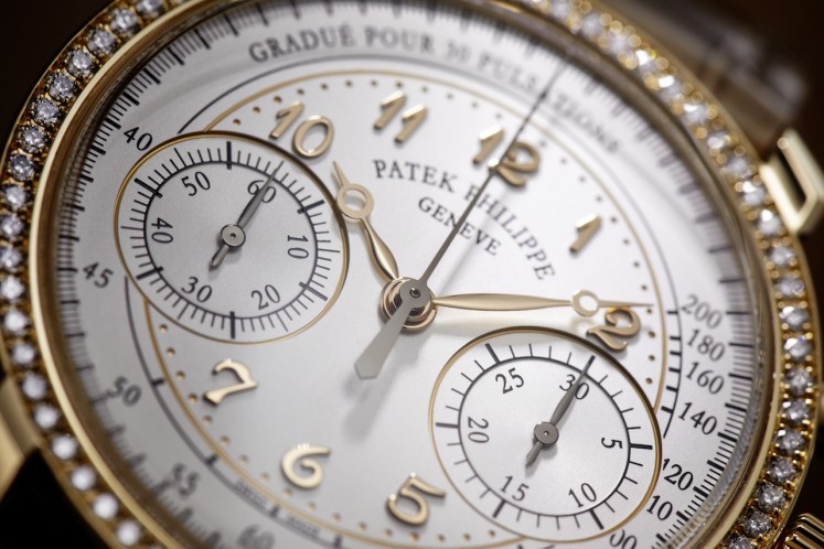 The silvery opaline dial of Patek Philippe's new Ladies First Chronograph, with applied Breguet numerals in 18K rose gold.