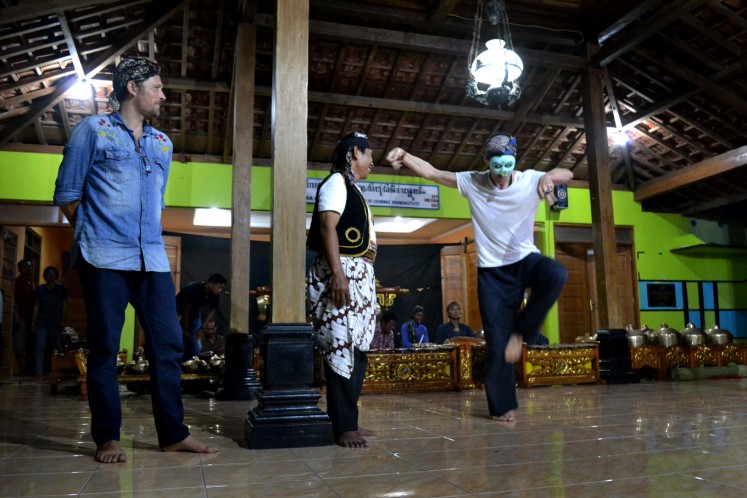 Villagers also taught the dance to the visitors. 
