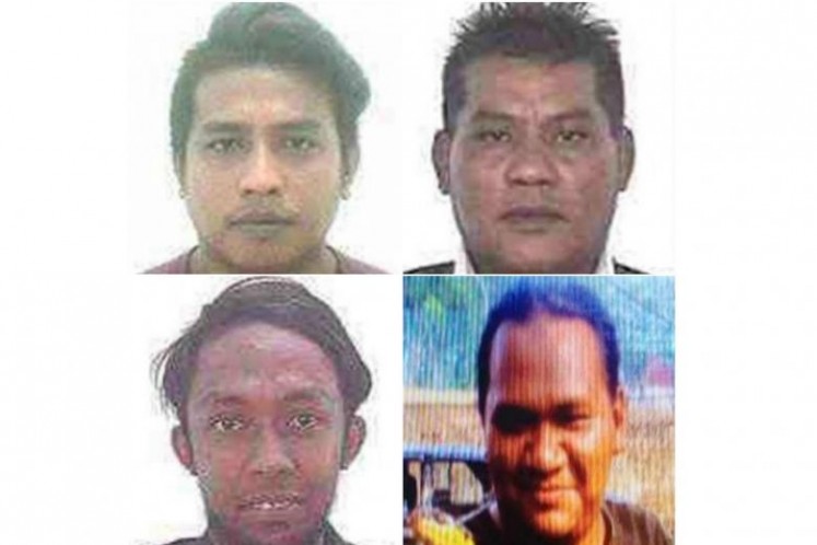 从左上起顺时针方向：列出的嫌疑人名叫Muhamad Faizal Muhamad Hanafi，Muhamad Hanafi Yah，他们都来自吉兰丹州，Awae Wae-Eya，泰国南部居民，Nor Farkhan Mohd Isa，地址在柔佛州南部