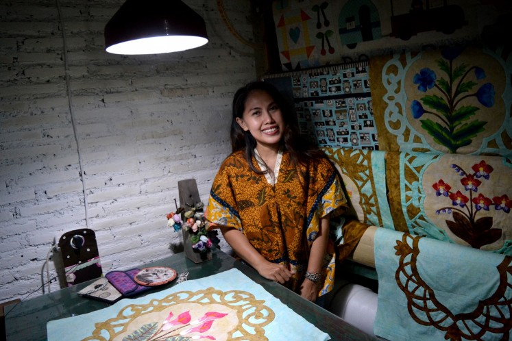 Elly Kuel creates handicrafts in her home workshop.