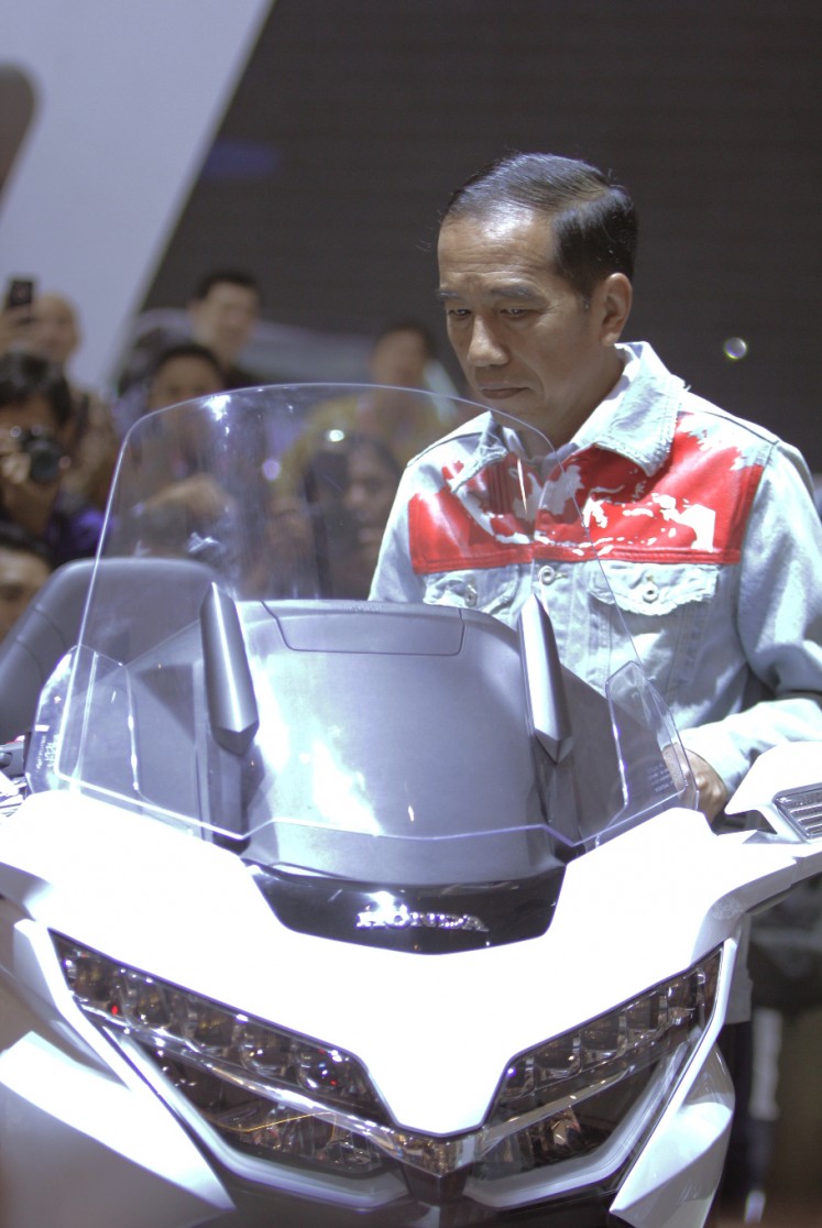 President Joko Widodo visits the Honda pavilion at the 2018 Indonesia International Motor Show at JIEXpo Kemayoran, Central Jakarta, on April 19.