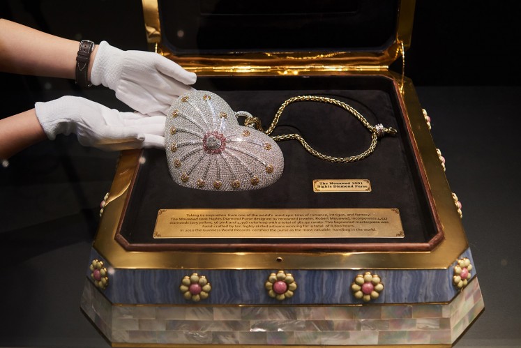 The 4,517-diamond Mouawad 1001 Nights Diamond Purse, with a total weight of 381.92 carats, is displayed during a Christie's auction preview in Hong Kong on October 17, 2017