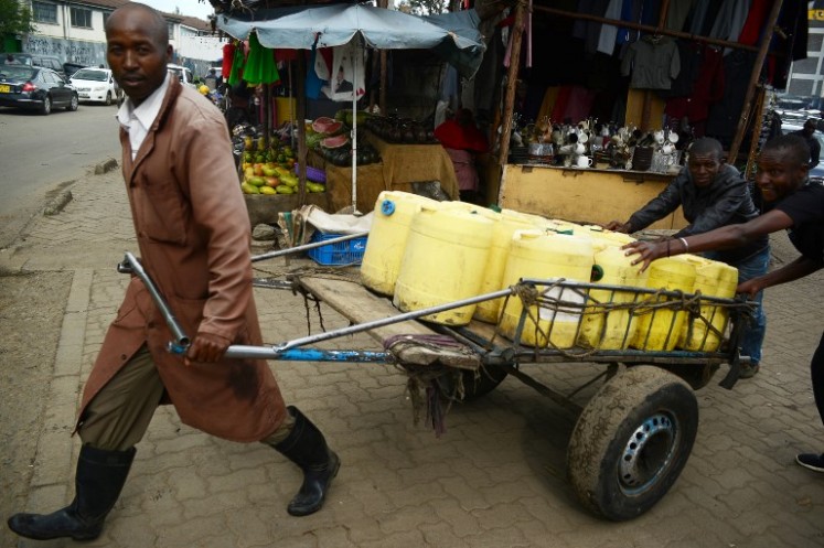 Photo taken on April 21, 2018, shows Samson Muli, a 42-year old father of two who has been a water vendor for the past 18 years, in Nairobi.