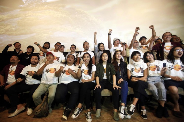 The crew and cast of 'Wiro Sableng' during the launch event for the movie's trailer at the Plaza Indonesia mall, Central Jakarta, on May 11. 