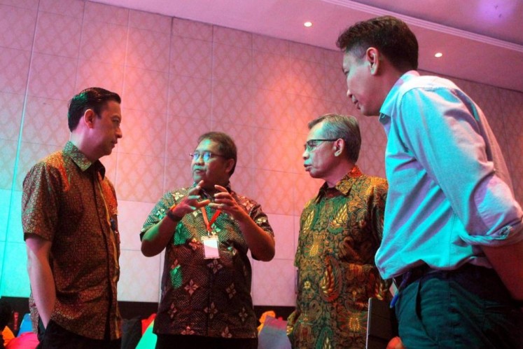 Big talk: Investment Coordinating Board (BPKM) chairman Thomas Lembong (left to right) in discussion with Communications and Information Minister Rudiantara, Financial Services Authority (OJK) chairman Wimboh Santoso and Bank Indonesia’s head of Payment Systems Policy Onny Widanarko  at the first Next Indonesian Unicorn (NextICorn) Summit in Nusa Dua, Bali, on Thursday.