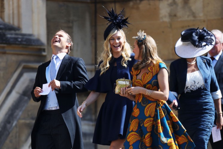 Chelsy Davy (C) arrives for the wedding ceremony of Britain's Prince Harry, Duke of Sussex and US actress Meghan Markle at St George's Chapel, Windsor Castle, in Windsor, on May 19, 2018.
