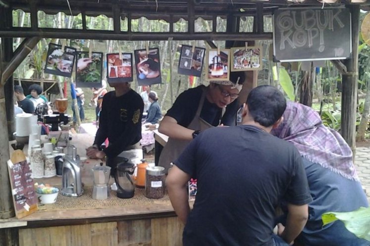 A kiosk serves coffee at Radja Pendapa in Kendal regency, Central Java.