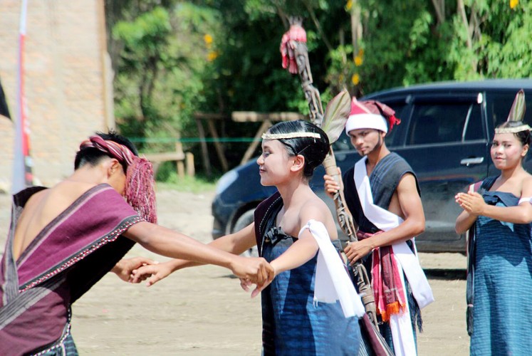 Finding your mate: Young Bataknese couples dance during the Gondang Naposo Festival in Samosir, North Sumatra.