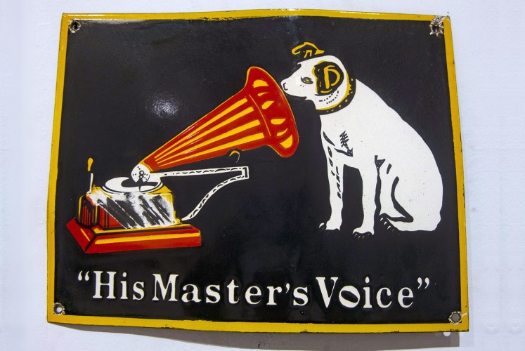 Listen up: An enamel sign depicts a dog and a gramophone.