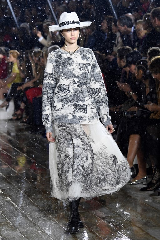 A model presents a creation for Dior during the 2019 Dior Croisiere (Cruise) fashion show on May 25, 2018 at the domaine de Chantilly, near Paris.