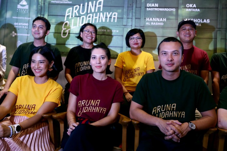 Crews and casts of 'Aruna and Her Palate'; (above, from left to right) producer Muhammad Zaidy, producer Meiske Taurisia, scriptwriter Titien Wattimena and director Edwin. (below, from left to right) Dian Sastrowardoyo, Hannah Al-Rashid and Nicholas Saputra. 