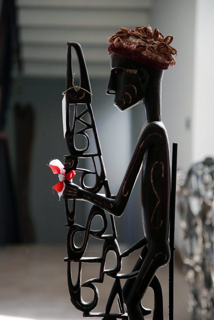 For the departed: An Asmat sculpture called Bisj (Mbis) which represents the ancestors.