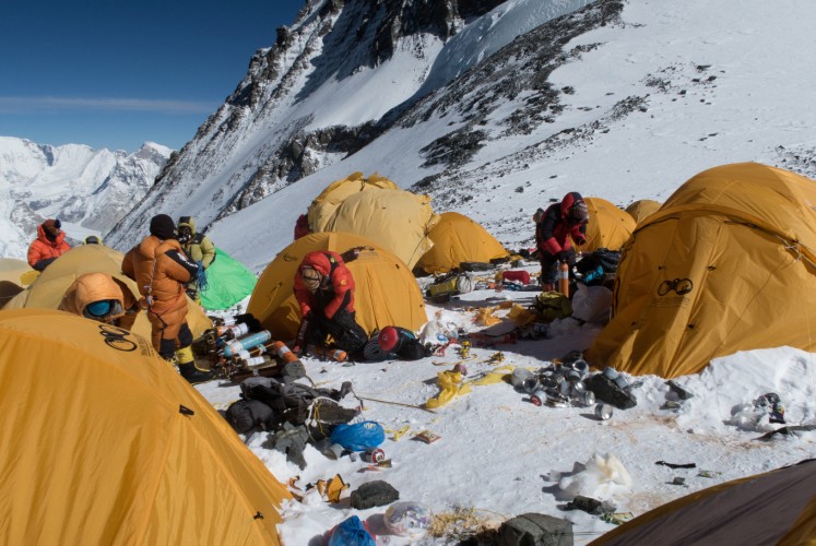 This handout picture taken on May 20, 2018 and released on June 12 by Damian Benegas shows discarded climbing equipment and rubbish scattered around Camp 4 of Mount Everest. Decades of commercial mountaineering have turned Mount Everest into the world's highest rubbish dump as an increasing number of big-spending climbers pay little attention to the ugly footprint they leave behind.