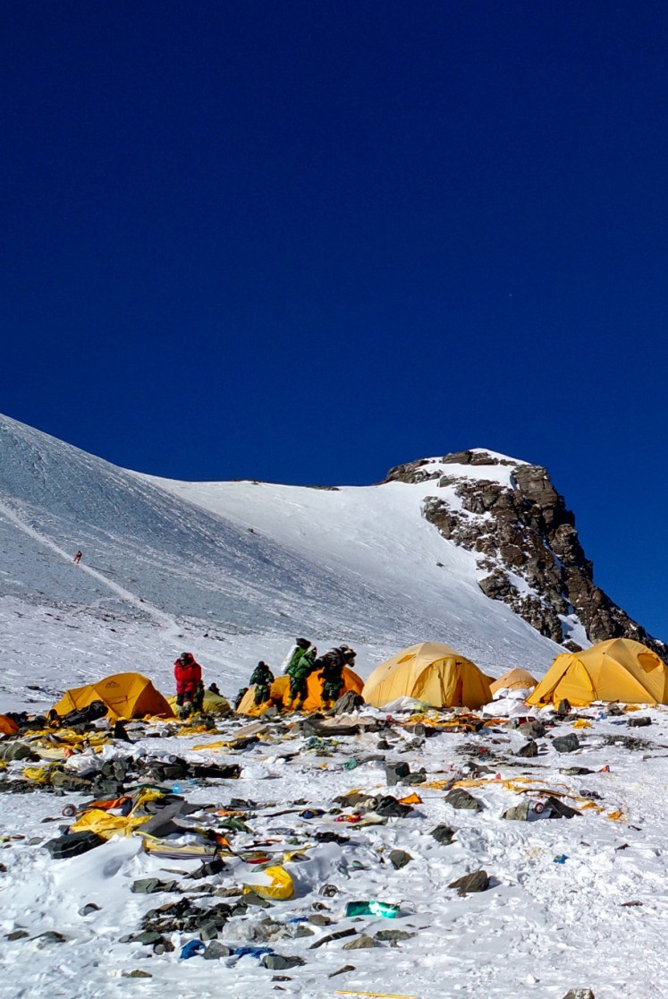 This picture taken on May 21, 2018 shows discarded climbing equipment and rubbish scattered around Camp 4 of Mount Everest. Decades of commercial mountaineering have turned Mount Everest into the world's highest rubbish dump as an increasing number of big-spending climbers pay little attention to the ugly footprint they leave behind.
