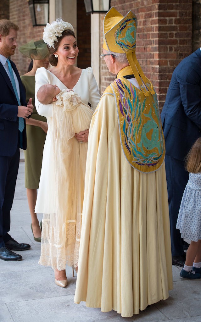 Britain's Catherine, the Duchess of Cambridge, speaks to Archbishop of Canterbury Justin Welby as she arrives carrying Prince Louis for his christening service at the Chapel Royal, St James's Palace, London, Britain, July 9