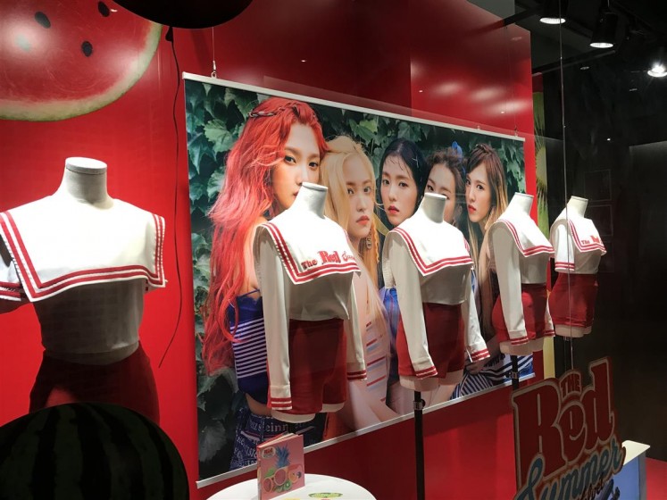 On display at SMTOWN are the cheerleader-inspired outfits that the girls of Red Velvet wore during their The Red Summer promotional period.