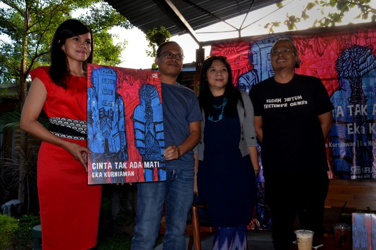 Eka, Alia Swastika (second from right) and Eko at the launch of “Cinta Tak Ada Mati”, which was published by Gramedia Pustaka Utama.