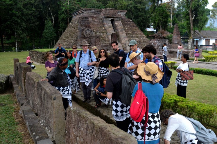 French students studying Javanese cultural history and philosophy at the Sukuh temple, Karanganyar regency, Central Java.