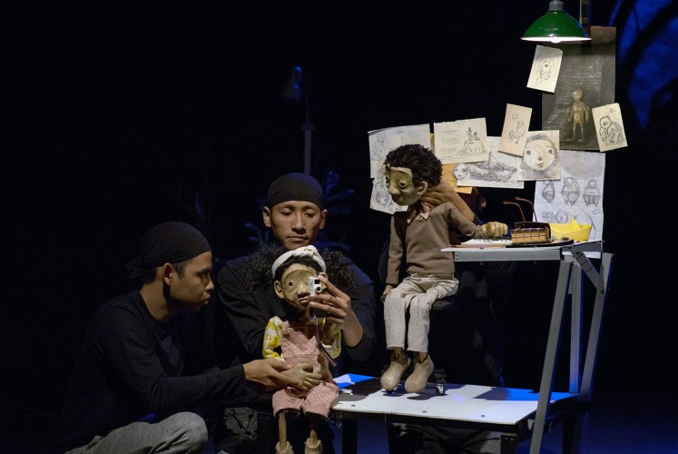 Father and daughter: Puppets of the characters Puno (right) and his daughter Tala (second right) are seen playing in their “home”.