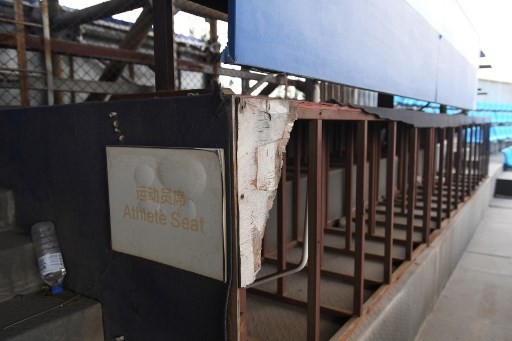 This photo taken on July 23, 2018 shows a rundown athlete seating area in the beach volleyball stadium built for the 2008 Beijing Olympic Games, in Beijing. A decade after Beijing hosted the 2008 Olympics, its legacy remains unmistakable from the smallest alleyways in the Chinese capital to the country's growing clout abroad. For better or worse, the Games changed the face of Beijing: from the iconic Bird's Nest stadium to the countless blocks of ancient homes bulldozed in an Olympic building frenzy.
